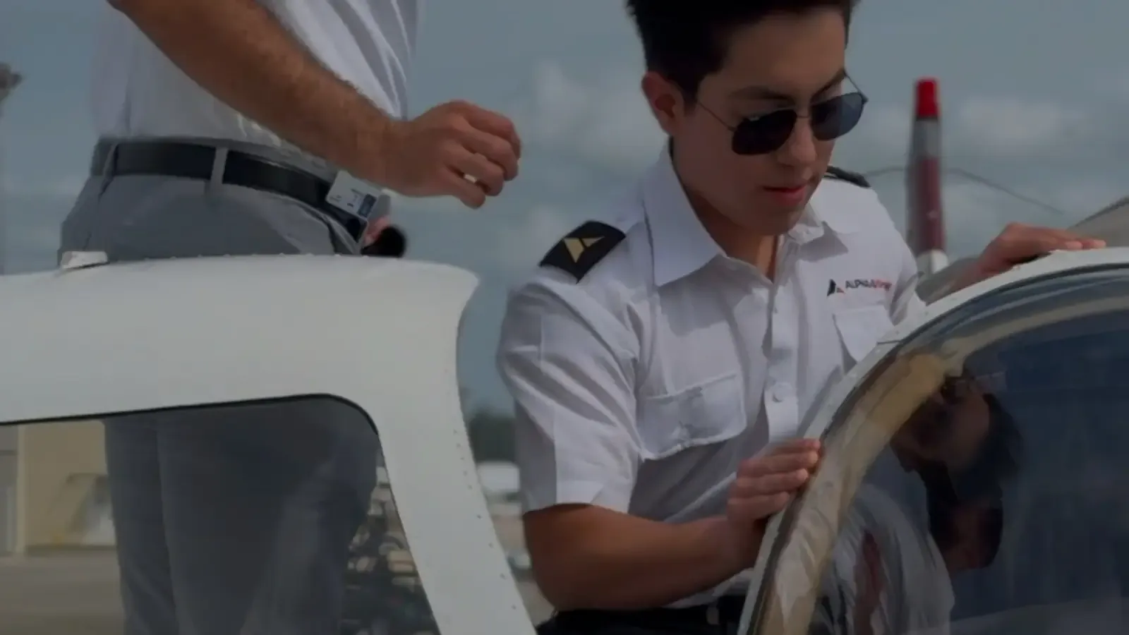 Alpha Aviation student pilot in a training aircraft